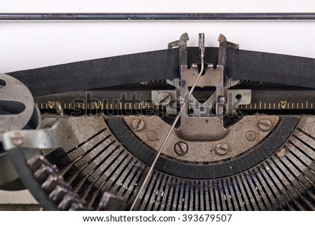 The machinery of an old typewriter, close-up
