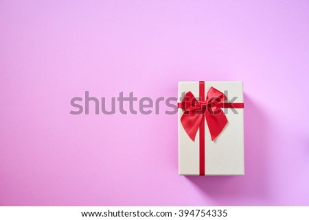 hand made gift box on rose quartz paper background
