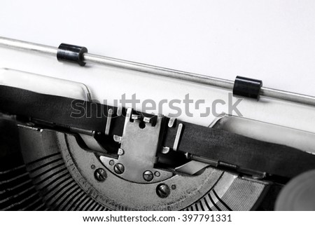 Old typewriter with paper, close up