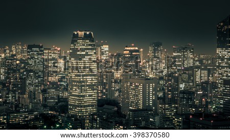 Night cityscape of TOKYO City taking on top of Tokyo building in Tokyo .