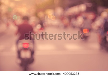 Blur traffic road with bokeh light in sunset abstract background.