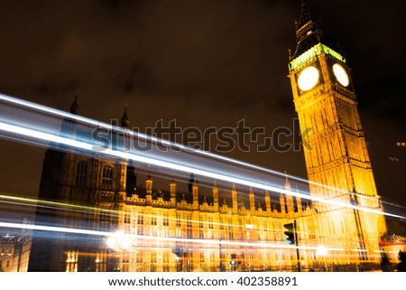 Big Ben by night with strong light tracks