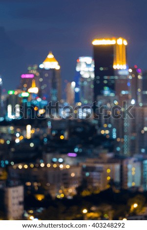 Blurred bokeh lights, city business tower night view