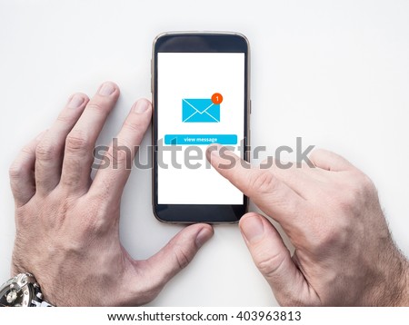 Man's hands using smartphone with Email app interface on screen