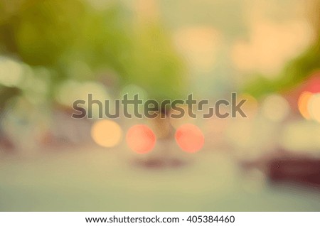 Blur traffic road with bokeh light abstract background. Retro color style.