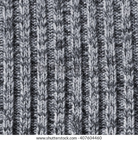 Grey knitted wool texture can use as background 