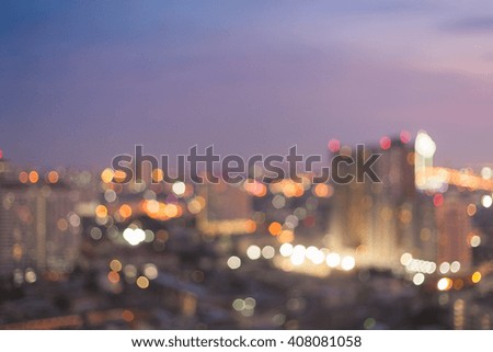 Cityscape blurred bokeh light background during twilight