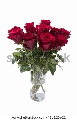Ten Red Roses in a Glass Vase on isolated white background