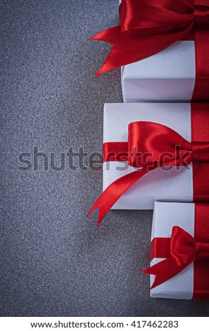 Collection of gift boxes on grey background holidays concept.