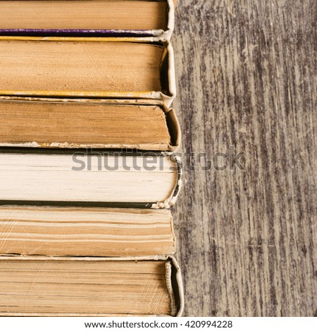Old Books On Wooden Background.