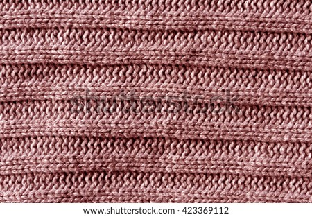 Abstract red knitting cloth texture.  Background and texture for design.
