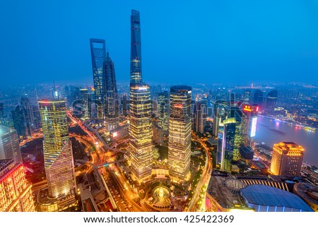 Night view of Lujiazui.  Since the early 1990s, Lujiazui has been developed specifically as a new financial district of Shanghai. 
