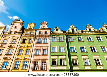 Fantastic view of the ancient homes on a sunny day. Gorgeous picture and picturesque scene. Location famous Market Square in Wroclaw, Poland, Europe. Historical capital of Silesia. Beauty world.