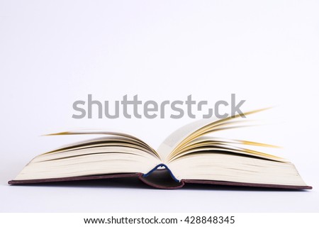 lecture - close up of a book - isolated on white background - studio shot - natural light