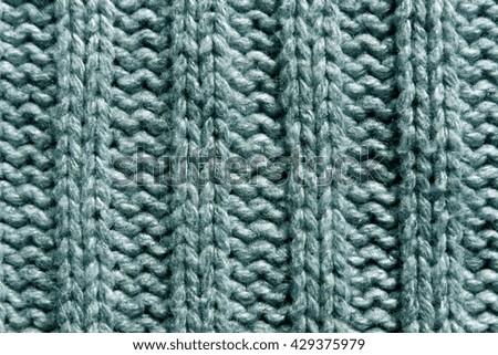 Abstract gray knitting texture close-up. Background and texture for design.