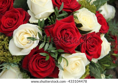 Red and white roses in a bridal bouquet