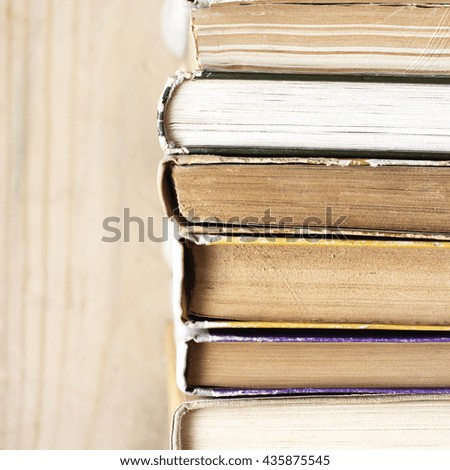 Books On Wooden Background.