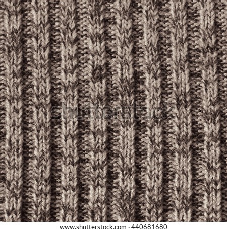 Beige knitted wool texture can use as background 