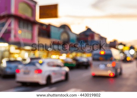 Blur car and traffic with light bokeh in twilight sky, city street scene