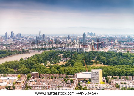 Beautiful aerial view of London with buildings and trees.