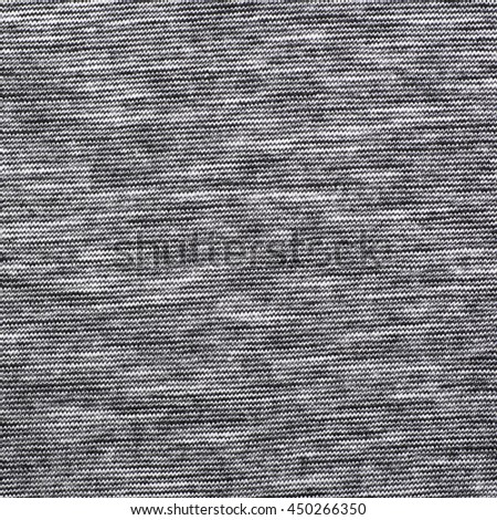 Fragment of a grey cloth fabric material texture as an abstract background composition