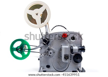 Retro old reel movie projector for cinema. With clipping path. A reels of motion picture film on a white background. Analogue movie projector with reels isolate on white background.