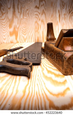 Set of carpenters working tools: plane, chisel, saw