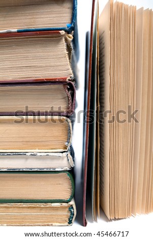 A large stack of old books. Isolated on a white background