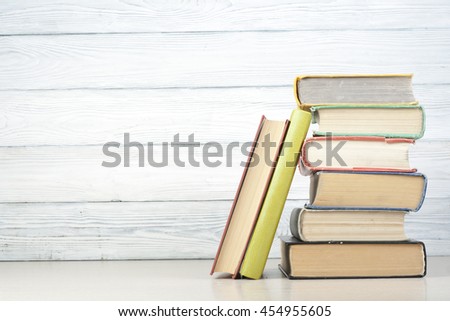 Stack of colorful books. Education background. Back to school. Copy space for text