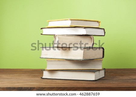 Stack of colorful books. Education background. Back to school. Copy space for text.