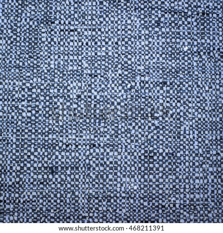 Rustic canvas fabric texture in blue color.
