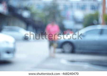 Blurred  background abstract and can be illustration to article of People walk in a parking lot