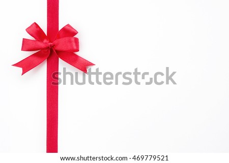 Shiny red ribbon bow isolated on white background, copyspace 