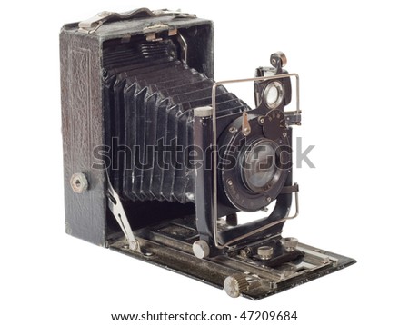 The out-of-date antiquarian harmonious camera isolated on a white background