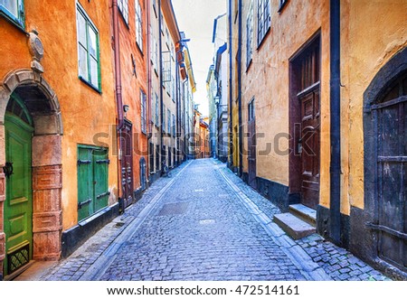 Charming colorfuk streets of old town in Stockholm, Sweden. artistic picture