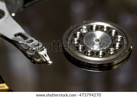 The hard drive from the computer disassembled, photographed close up