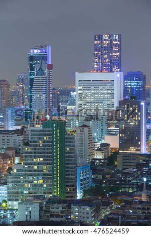 View of night light cityscape bangkok business downtown, with Mahanakorn Building the new highest tower in Thailand.