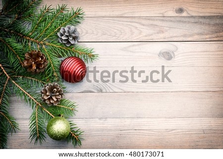 Christmas deco on wood table. Xmas card card with copy space. Holiday background.