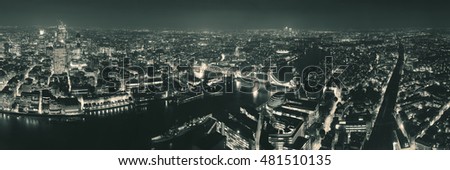 London aerial view panorama at night with urban architectures and tower bridge.