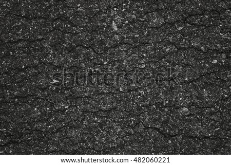 Asphalt background texture with some fine grain in it