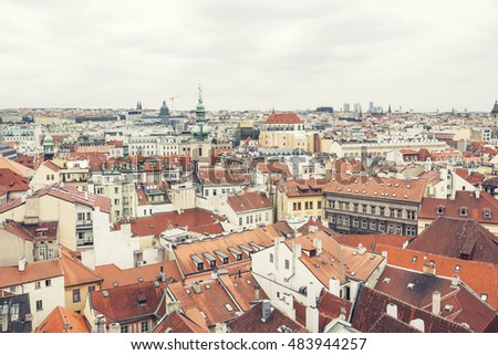 Prague rooftops, beautiful aerial view of Czech baroque architecture with red roofs.