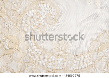 Beige lace texture background. Closeup