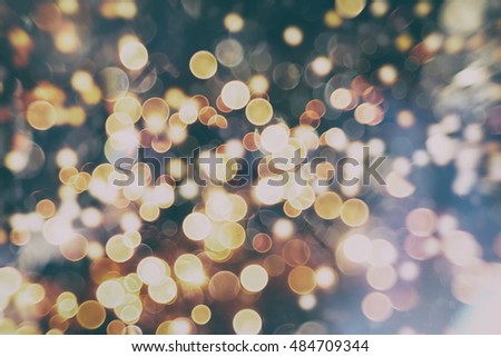 Christmas wallpaper decorations concept.Sparkle circle lit   celebrations display.colored abstract blurred light   background layout design.Festive elegant abstract   background