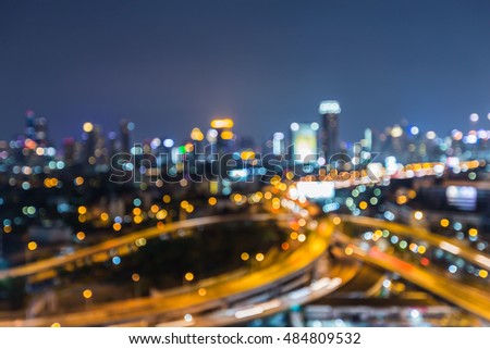 Abstract blurred lights city highway interchanged at twilight