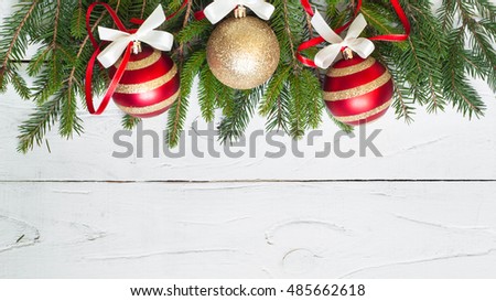 Christmas background. Christmas decorations on white wooden table. Top view, copyspace.