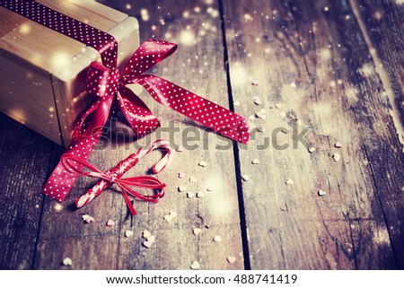 Gift box on wooden background/ holidays gift background