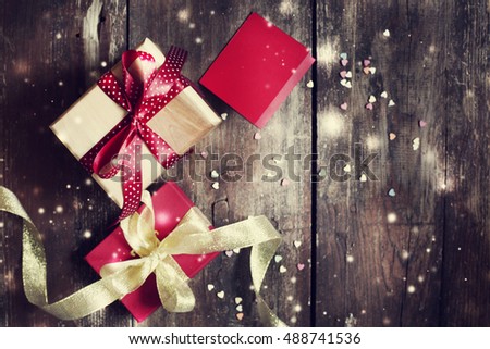 Vintage gift boxes on wooden background/ holidays gift background