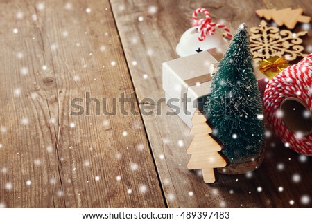 Image of christmas tree next to decorations. Selective focus