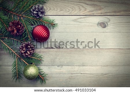 Christmas deco on wood table. Xmas card card with copy space. Holiday background.