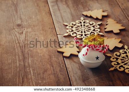 Image of  wooden christmas decorations on the table. Selective focus